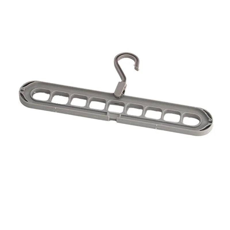 Plastic nine-hole folding pant hanger in multiple colours for dormitory wardrobe organisation
