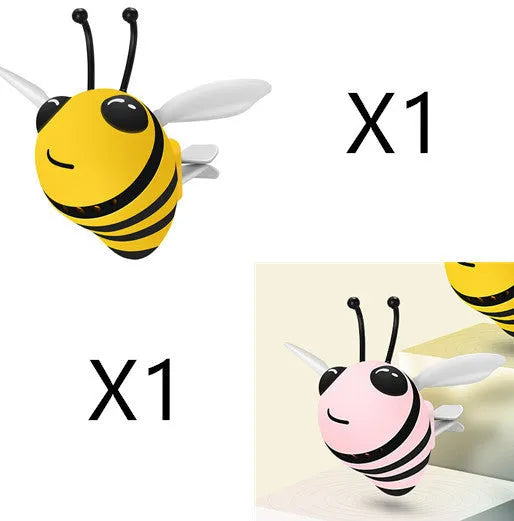 Little bee shaped car vent clip in yellow with metal alloy perfume seat and solid fragrance tablet