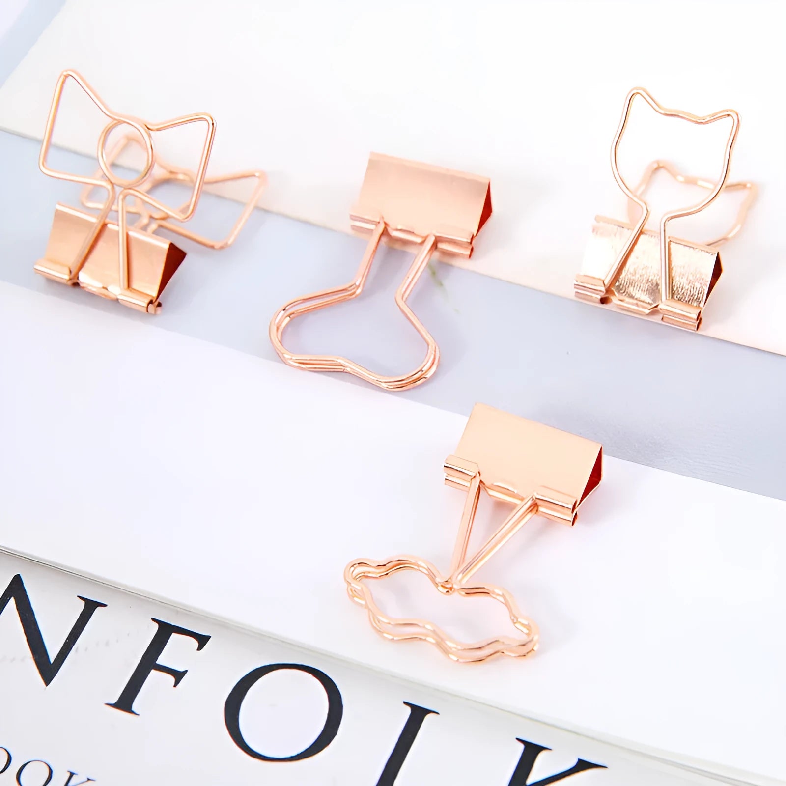 Gold metal decorative paper clip with long tail design in various shapes including flamingo, love and cat