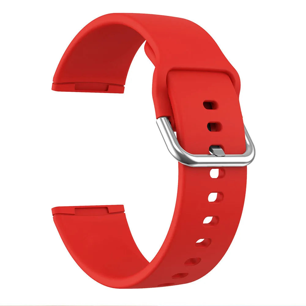 Solid colour silicone replacement strap with silver buckle for Fitbit Versa 3 and Sense 2 fitness trackers.