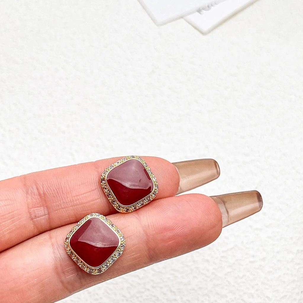 Red geometric square plate earrings with retro style and inlaid detailing
