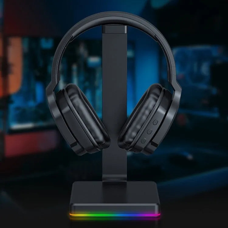 Luminous black wireless gaming headphones with head-mounted design showing LED lighting elements