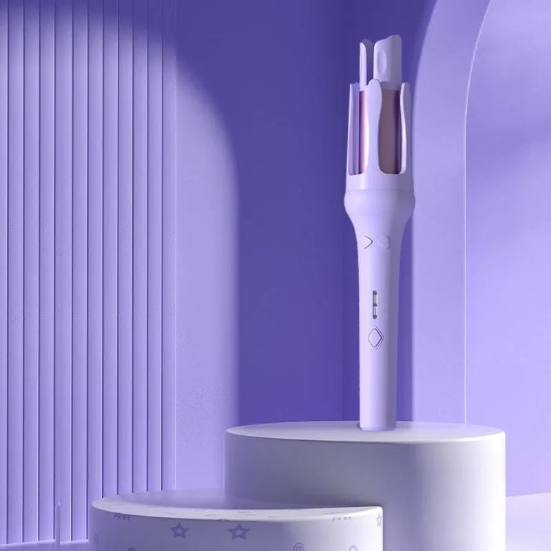 White automatic hair curler with 32mm ceramic barrel on a countertop.