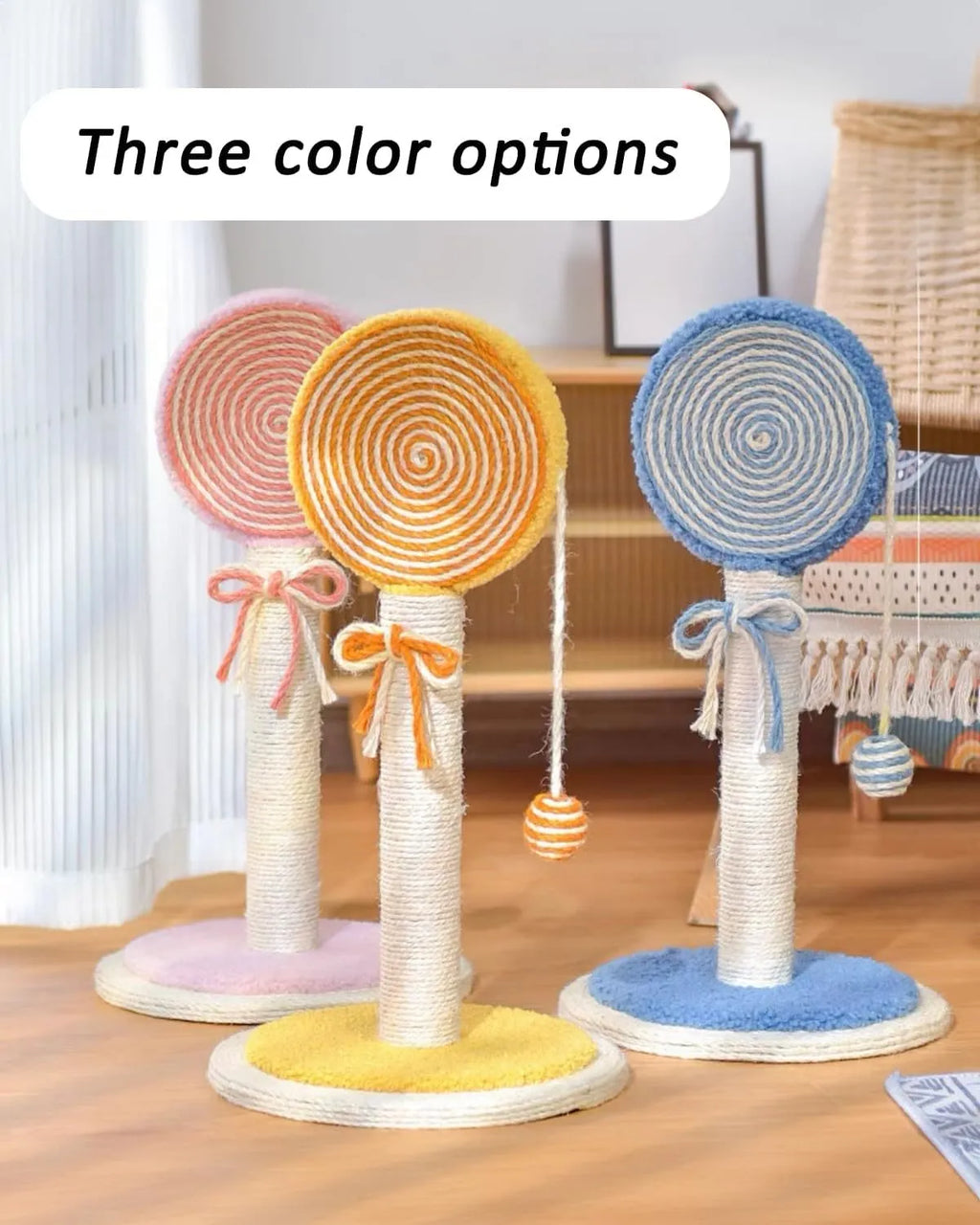 Cat scratching post with natural sisal rope surface and hanging ball toy on heavy-duty stable base