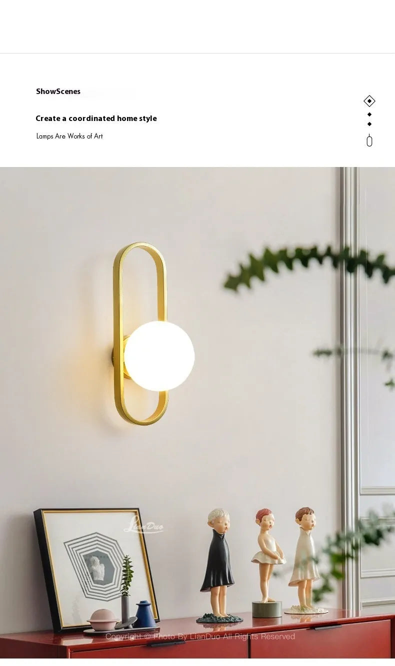 Minimalist wall lamp with glass shade and iron body in black or gold finish showing 12W bulb options