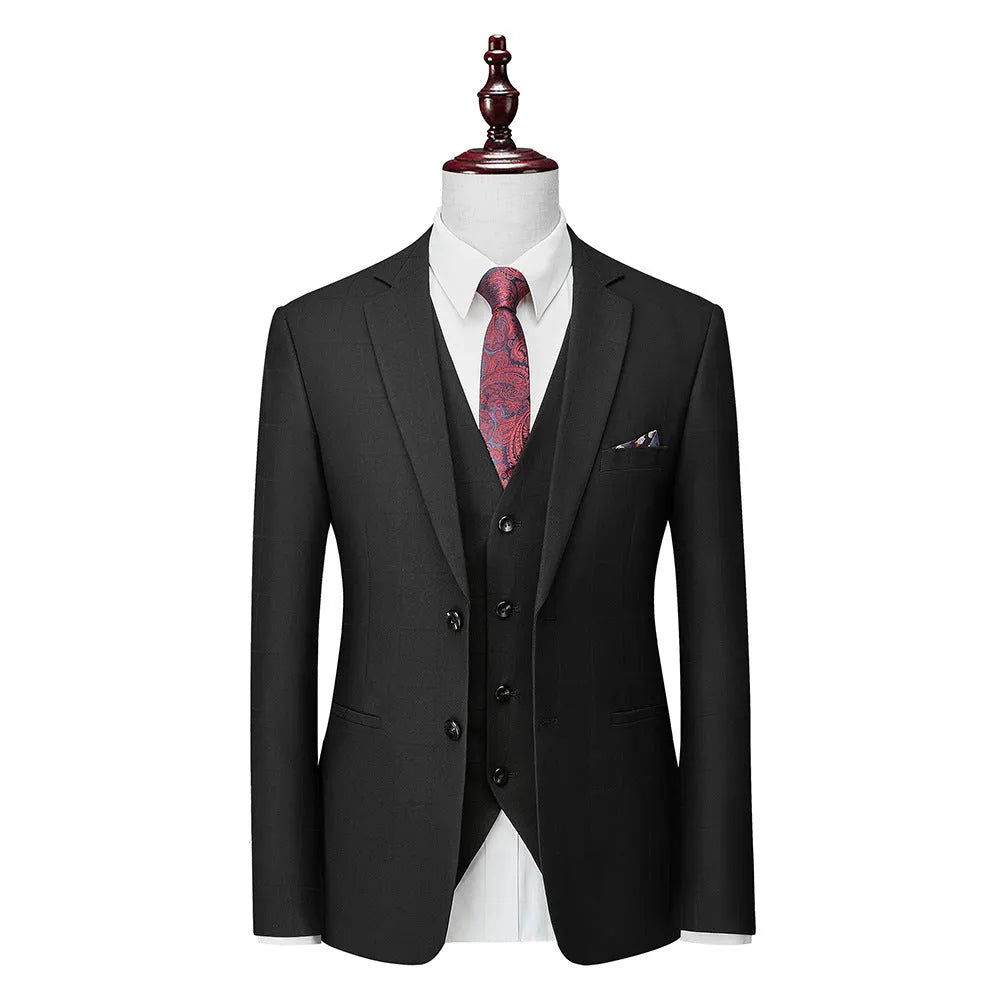 Men's navy blue slim fit three-piece suit with vest, jacket, and trousers for business casual occasions
