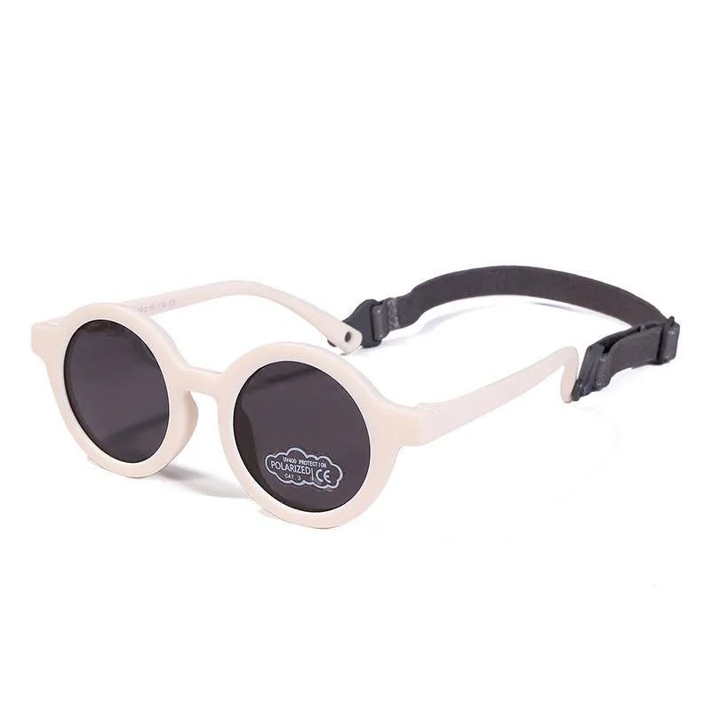 Children's silicone sunglasses with round frames for 0-3 year olds in multiple colour options showing UV400 and polarized protection
