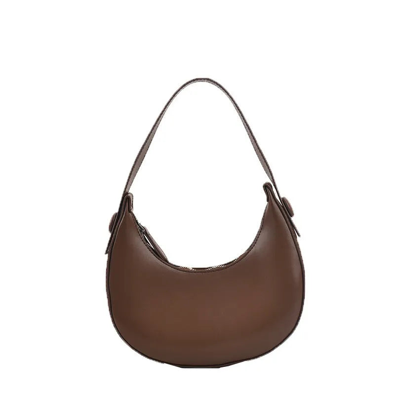 Women's retro dumpling shape shoulder bag in black with sandwich pocket and synthetic leather lining