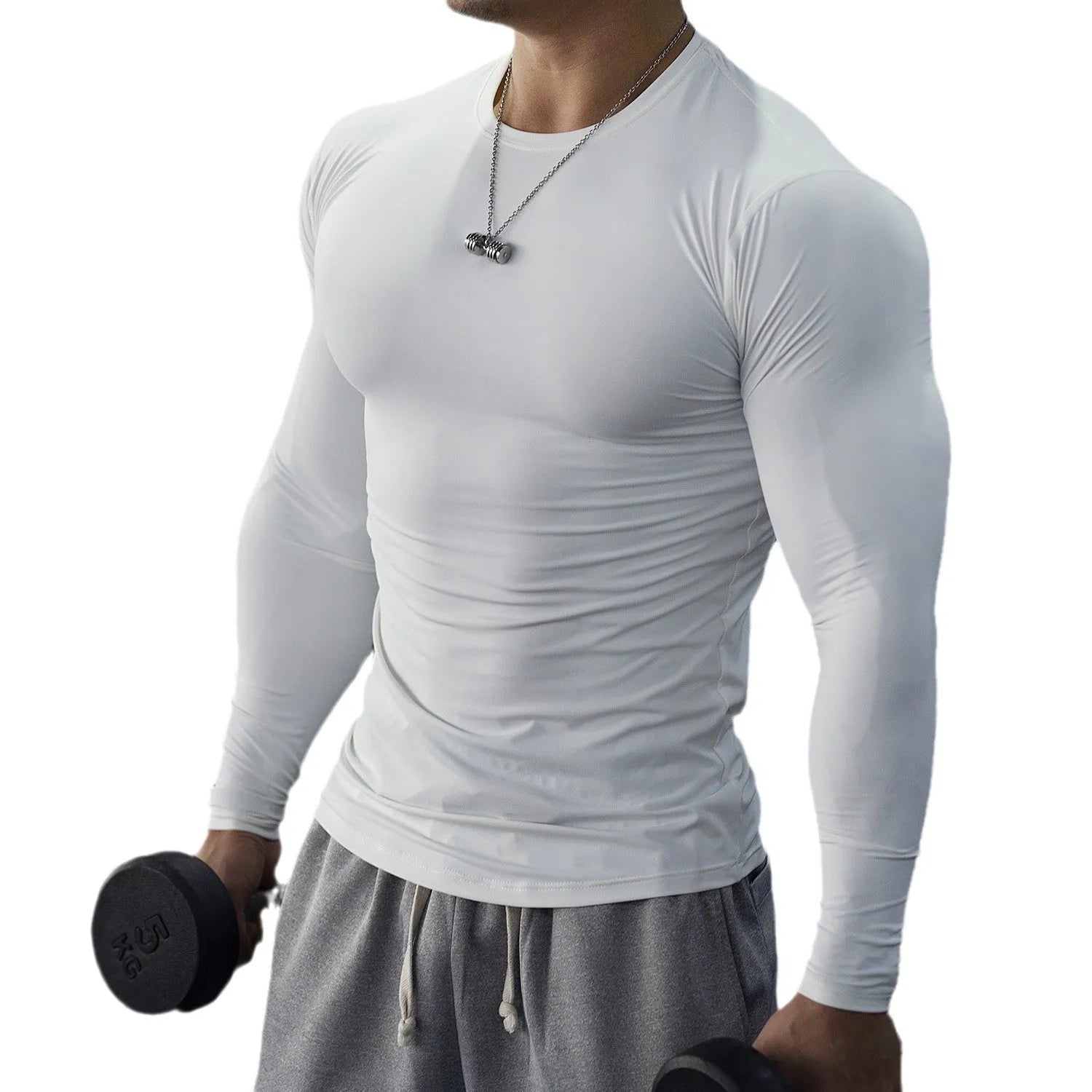 Men's slim fit black fitness tights with long sleeves for running and gym workouts.