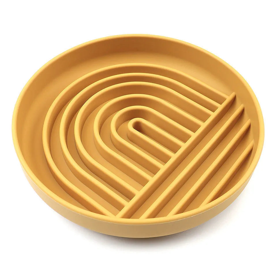 Silicone slow feeder dog bowl with textured ridges and nooks for slow eating, shown in assorted colours.