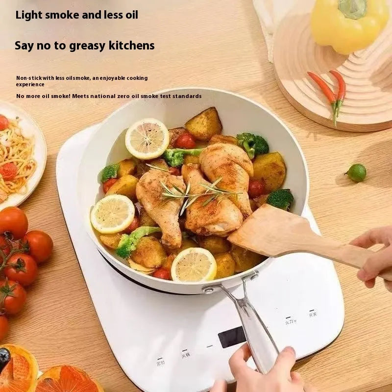 28cm pebble ceramic non-stick stir fry pan with refined iron body and stainless steel glass lid on a kitchen counter