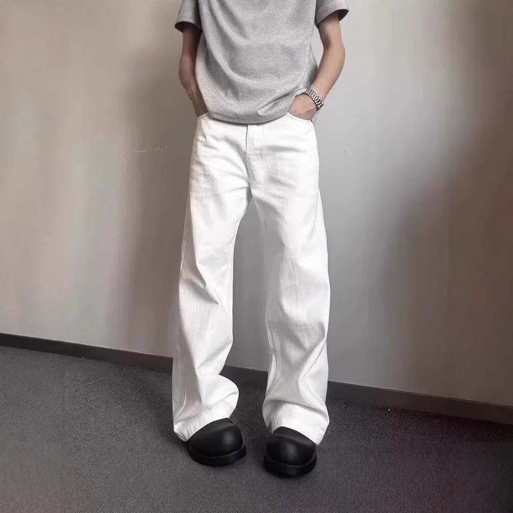 Men's white straight leg jeans with loose fit and mid waist design