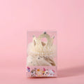 Cat wearing a princess crown headdress with a beige veil, pet wedding accessory