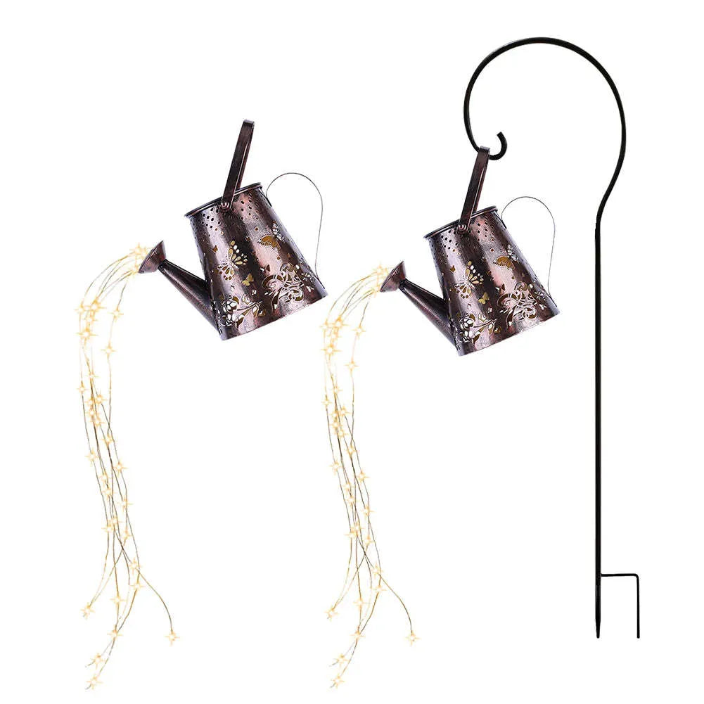 Tapered butterfly pattern iron solar garden lamp with warm white LED light.