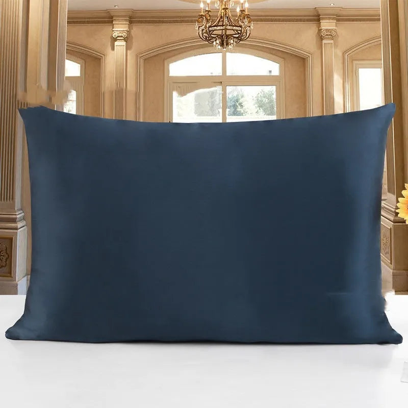 Double-sided 19 M silk pillowcase in apricot colour, showing reversible construction and standard UK size.