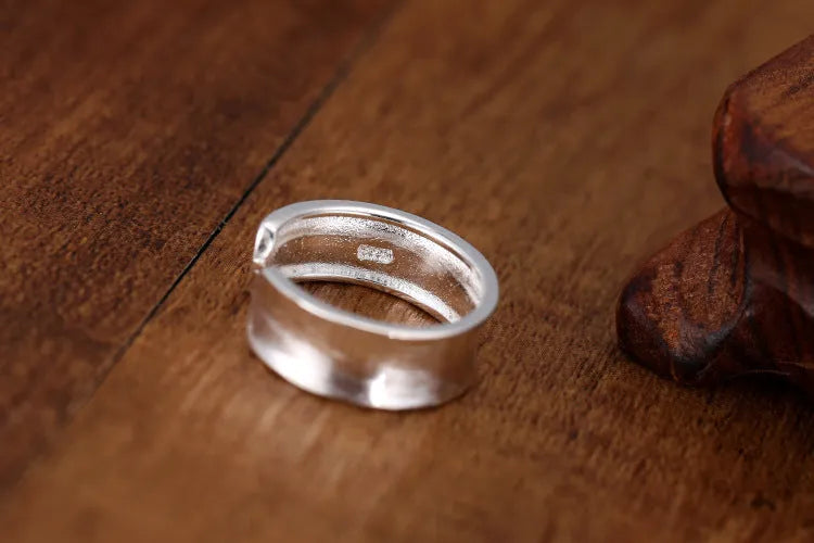 Geometric sterling silver ring with adjustable opening and frosted electroplated finish