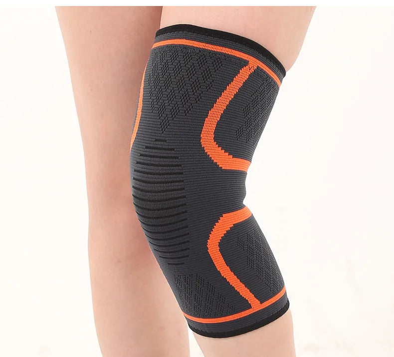Double corrugated non-slip sports knee pads in various colours on a grey background.