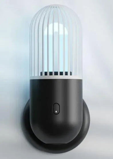 Portable capsule ultraviolet disinfection lamp in black, brown, green or white with dimensions 52x52x136mm