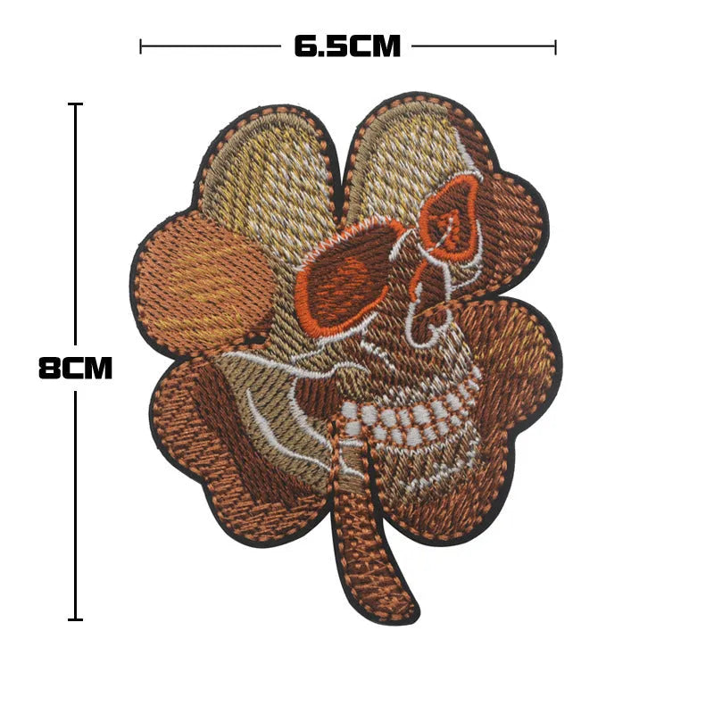 Embroidered fabric badge with hook and loop backing in various colour designs for industrial textile use