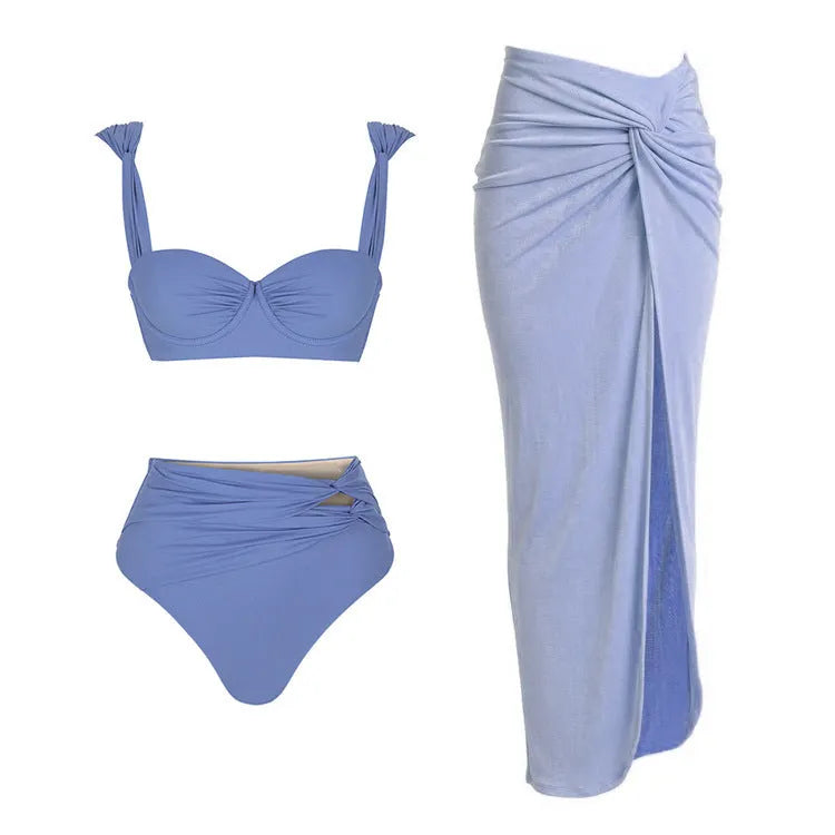 Women's one-piece swimsuit with skirt and gold buttons in solid colour options