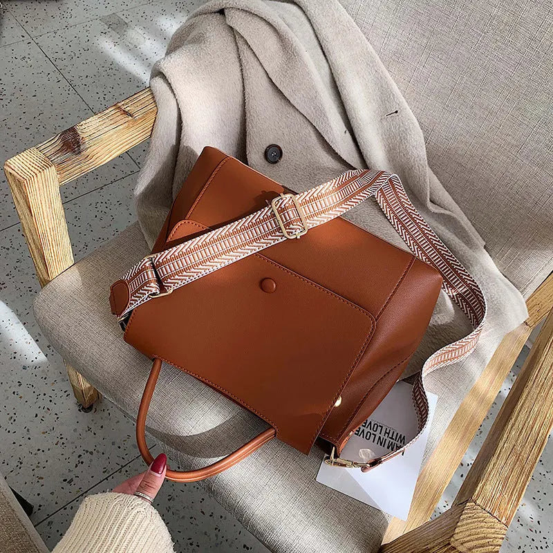 Fabric texture PU handbag in beige colour with atmospheric fashion style for everyday use
