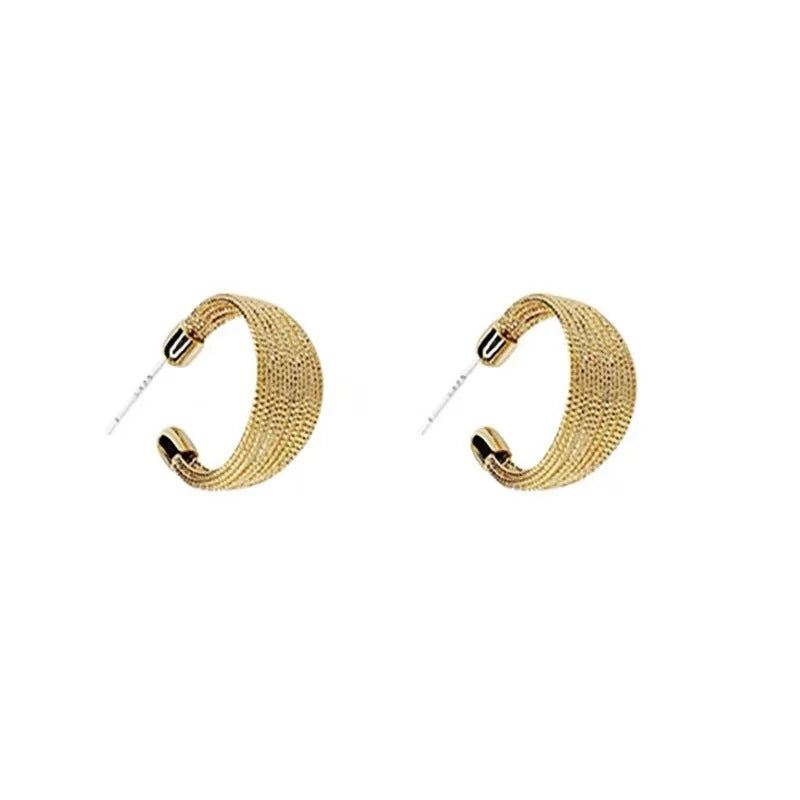 Geometric copper stud and clip earrings in gold and silver electroplated colours with simple multi-layer design