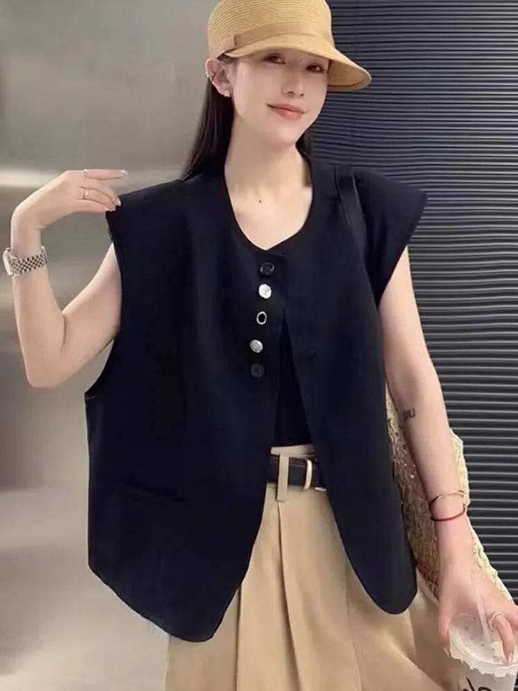 Women's polyester vest in milky white with pocket detail and loose fit design