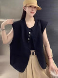 Women's polyester vest in milky white with pocket detail and loose fit design