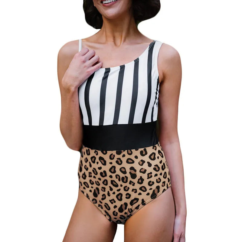 Leopard print women's one-piece swimsuit with an asymmetric collar and high-waisted brief.
