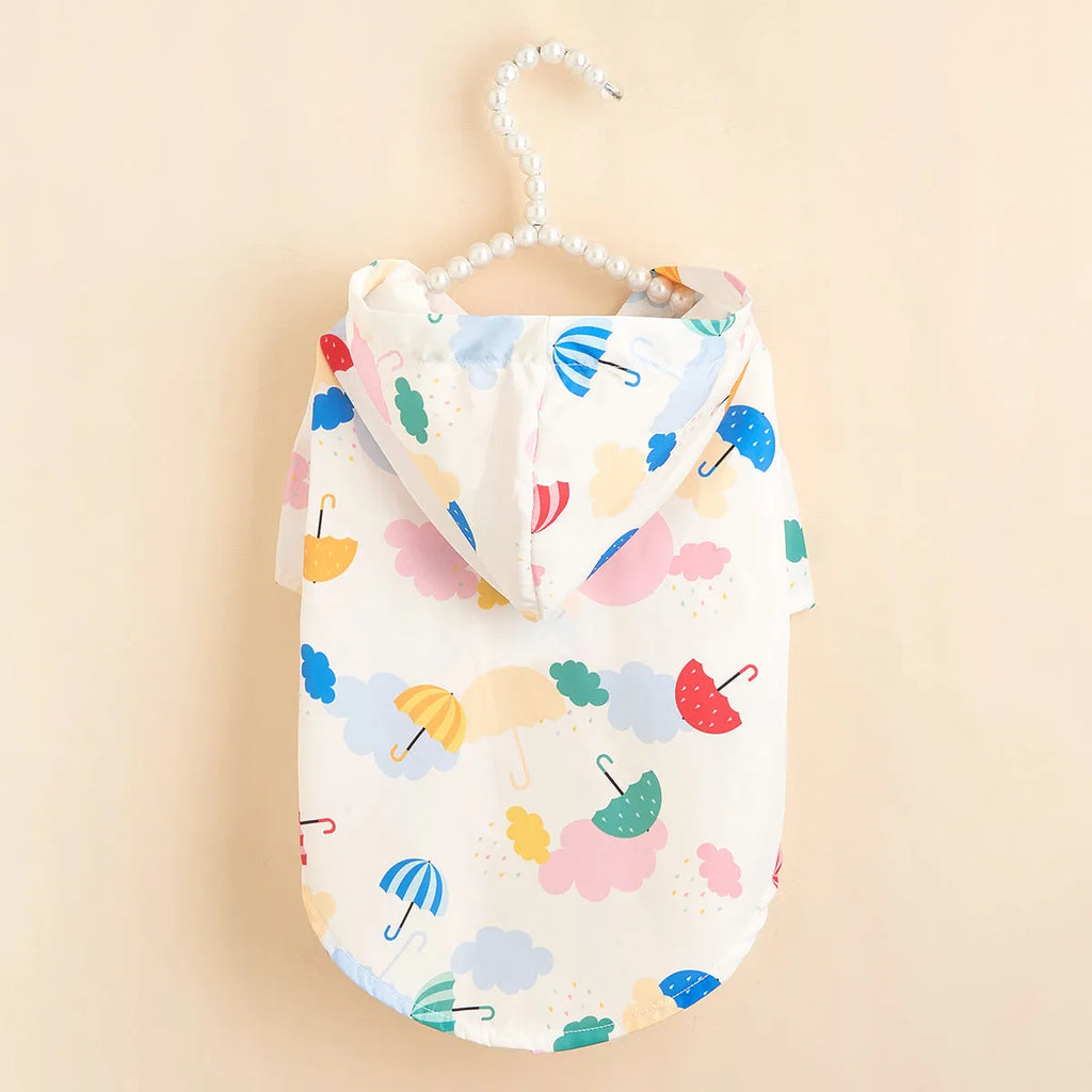 Colourful cartoon umbrella pattern dog and cat raincoat made from polyester fabric.