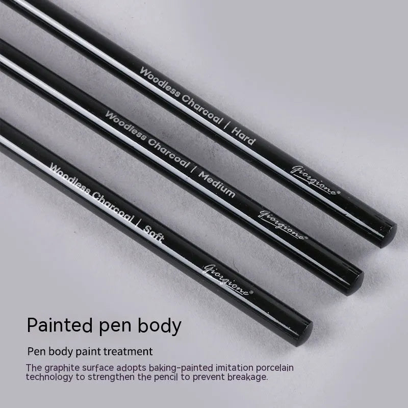 Set of six graphite and three carbonized drawing pencils with wooden casings on a suction card.
