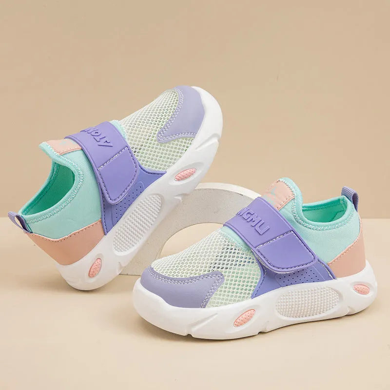 Children's slip-on shoes with soft rubber sole and PU upper in blue green colour on white background