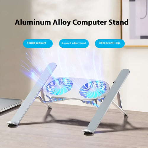 Silver aluminium laptop stand with dual cooling fans in folded position on desk