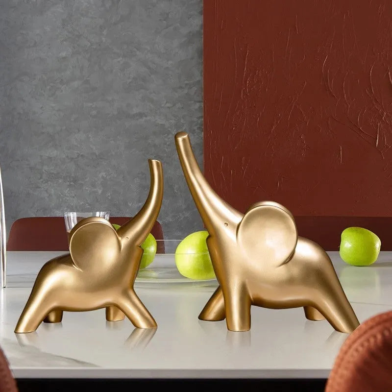 Modern Fortune Bring Elephant resin ornament in rose gold on a plain background