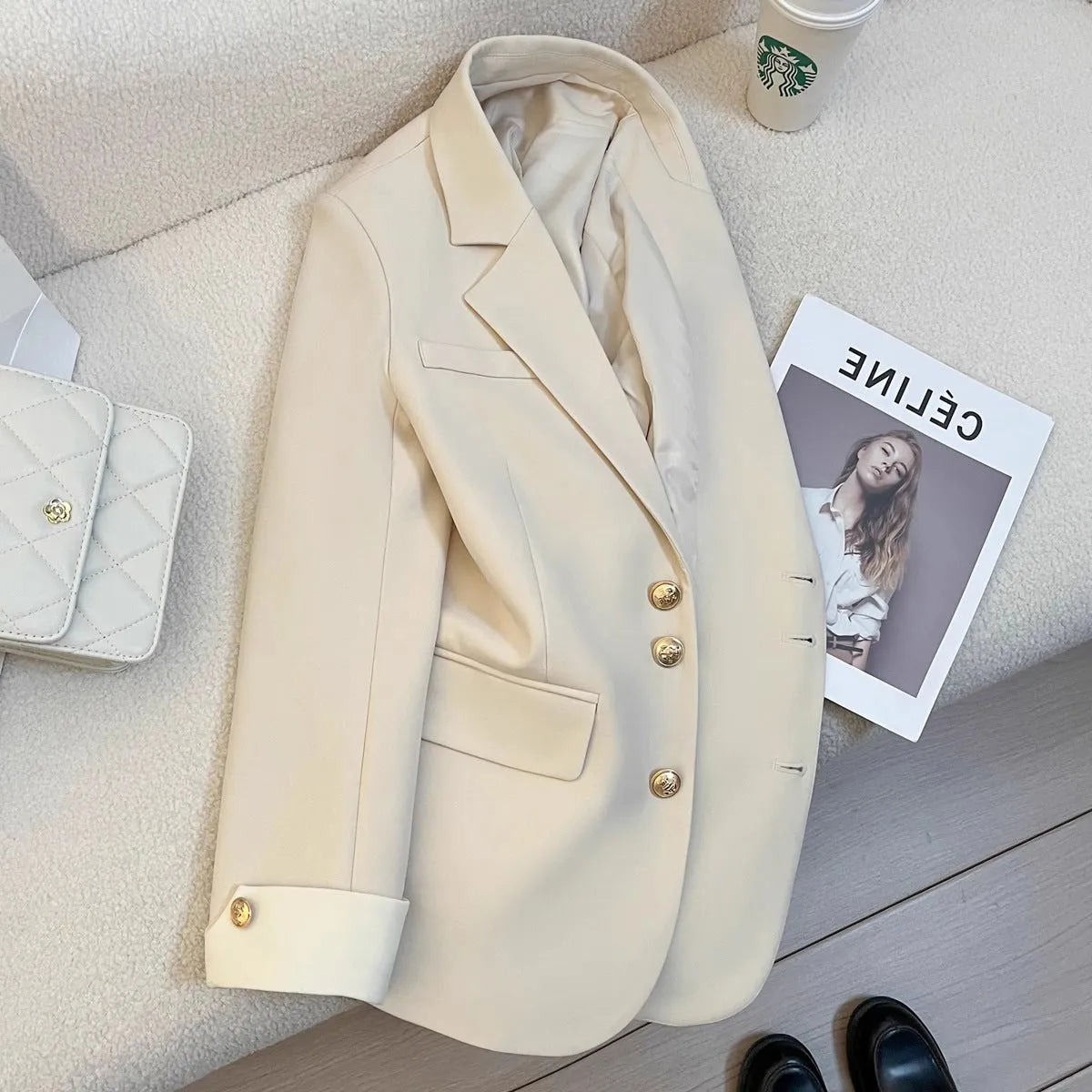 Women's Korean style loose fit coat in milky white with pockets and mid-length cut