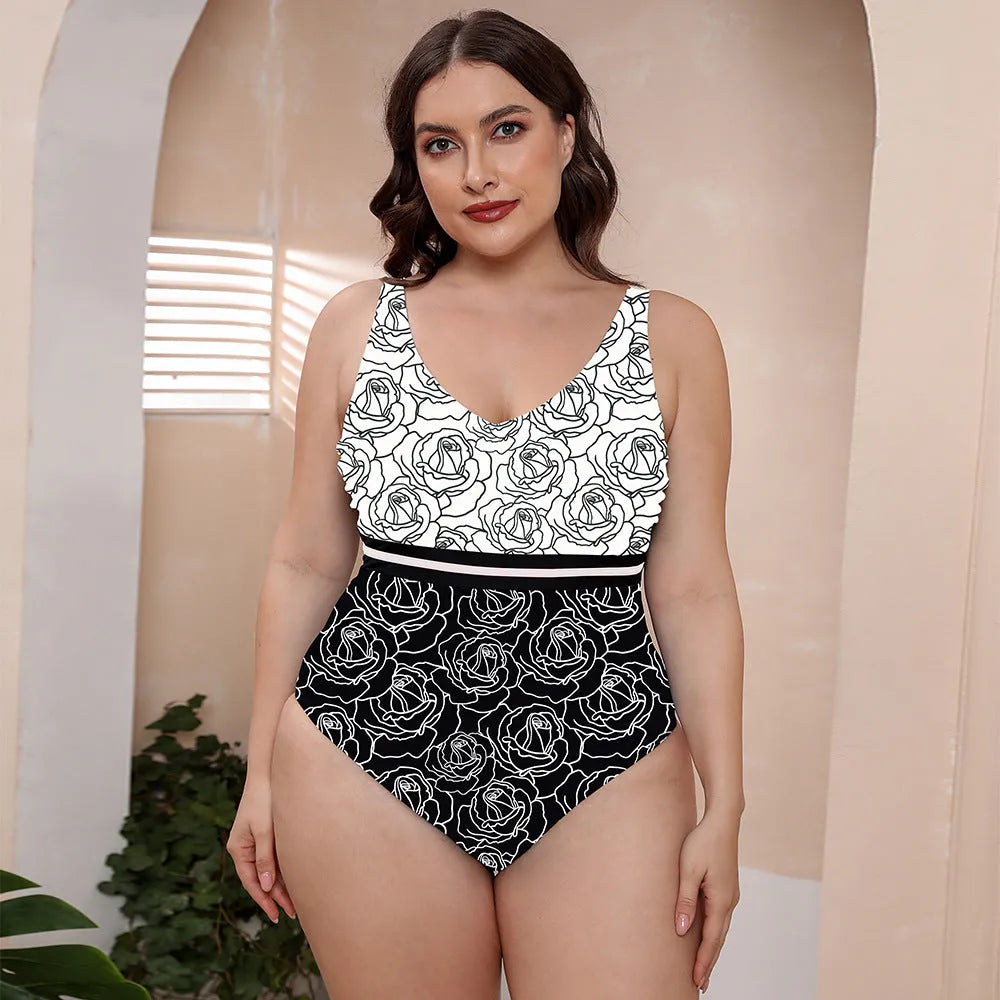 Women's printed spaghetti strap one-piece swimsuit in blue, white, and green patterns with vest style