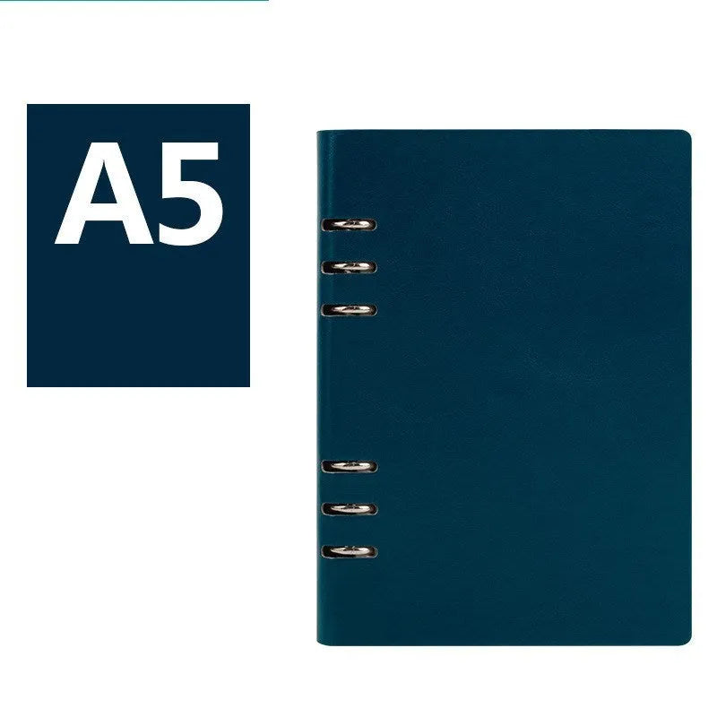 Loose-leaf business notebook with imitation leather cover in multiple colours, open to show beige paper.