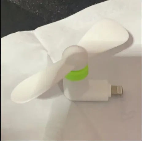Portable smartphone mini fan in six colours showing USB connector and plastic blades