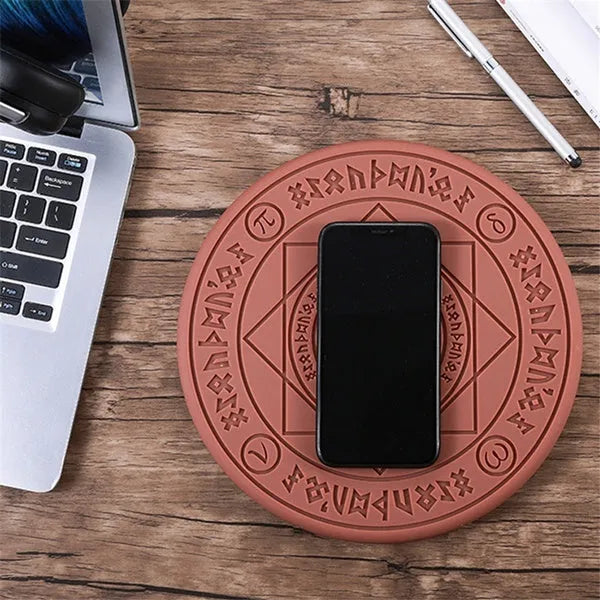Square wireless phone charger with glowing magic array pattern showing 10W fast charging