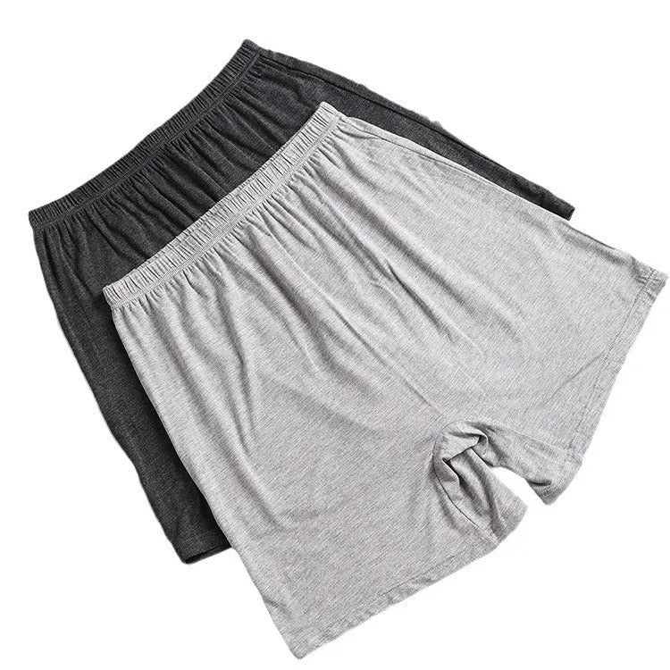 Men's solid colour modal boxer shorts with high waist in black, displayed flat.