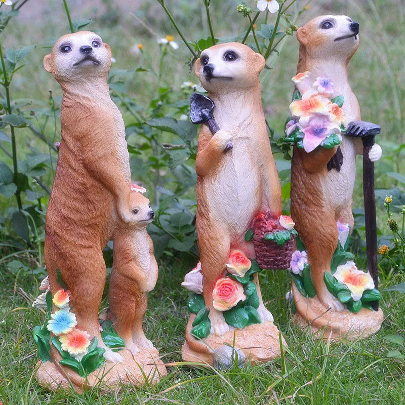Resin mongoose garden ornament with straw hat and garden tool accessory