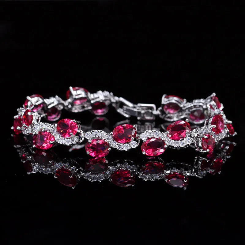 Copper-plated bracelet with gold electroplating and zircon stones in geometric design