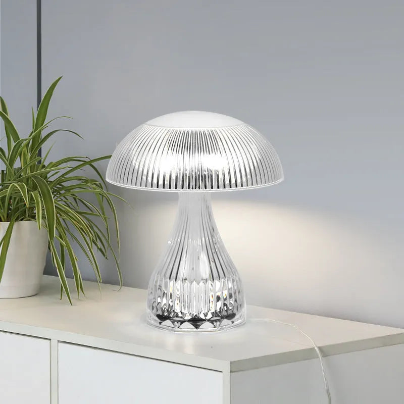 USB rechargeable bedside lamp with touch control and three-colour LED light on tabletop