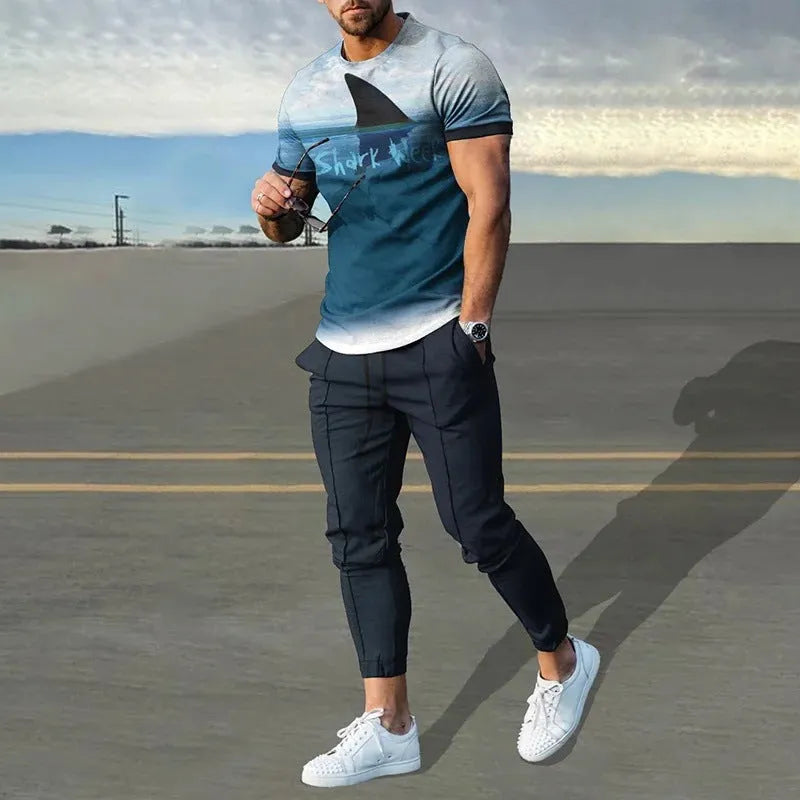 Men's short sleeve printed top and trouser sport suit set in polyester blend fabric.
