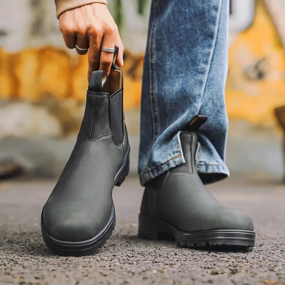 A pair of vintage-style unisex Chelsea boots in artificial PU leather with a beef tendon sole