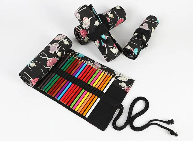 Square canvas pencil case with ballet girl print, shown open to display rolling storage for multiple pencils.