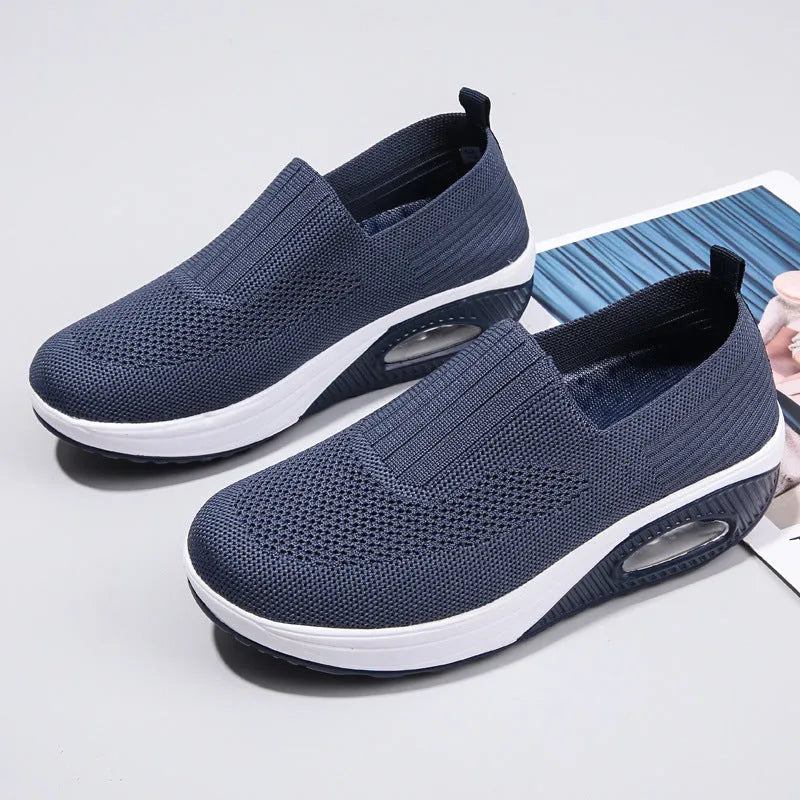 Women's mesh running shoes with air cushion technology in multiple colour options
