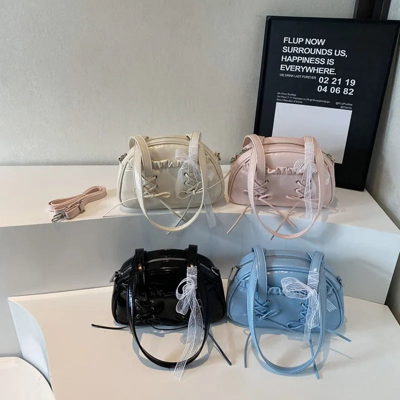 Women's casual bandage bow handbag in PU with shoulder strap and sewing thread detailing.