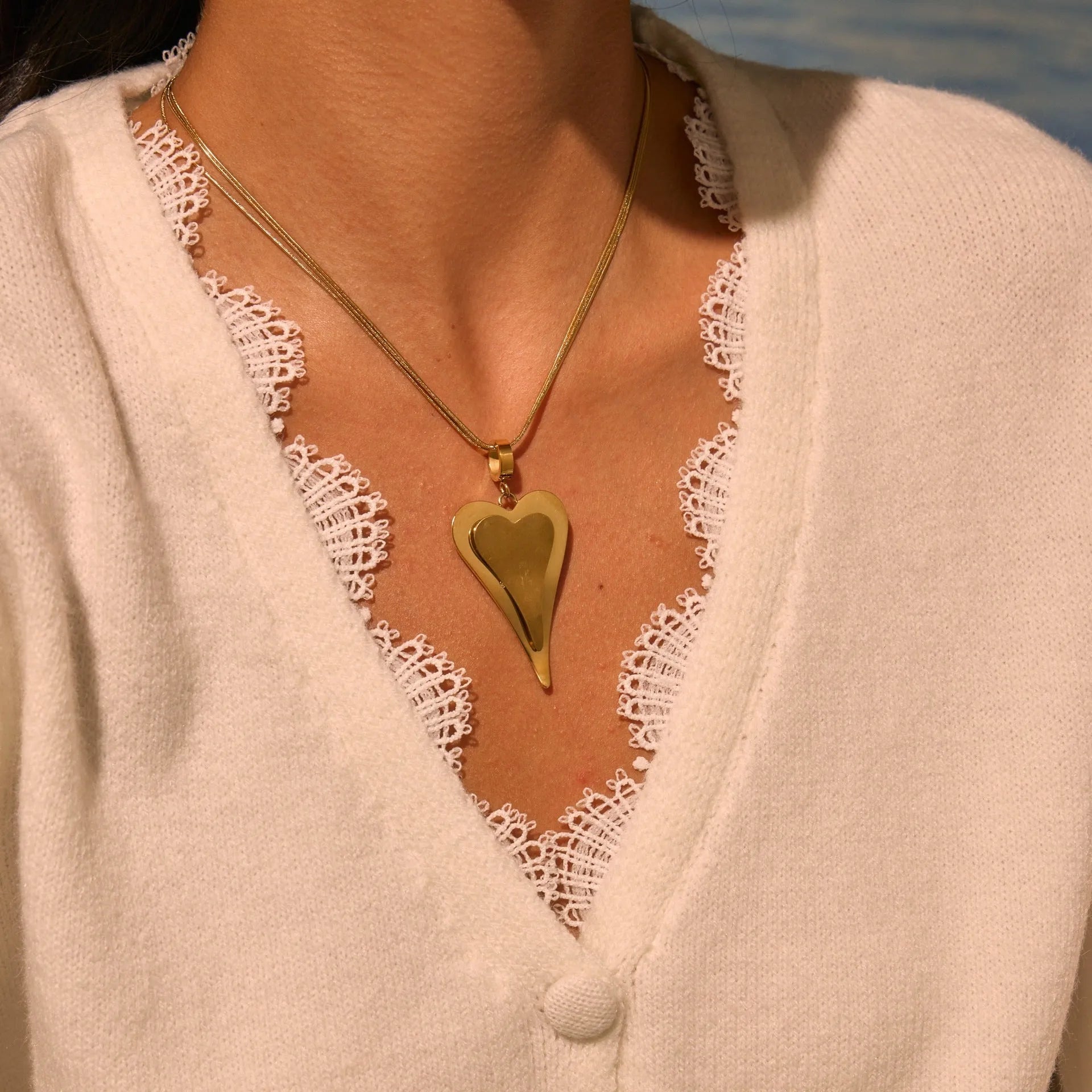 Women's stainless steel double heart snake bones chain necklace with geometric pendant