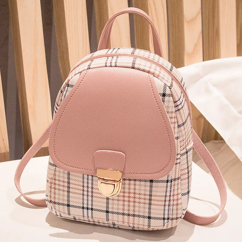 Diagonal one shoulder phone bag in PU leather available in five colours.